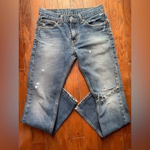 Levi’s Straight Boot Cut Pre-Torn Jeans.